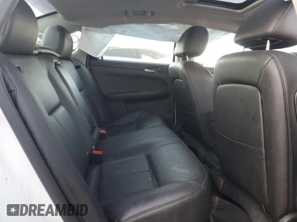 ✅ 2014 Chevrolet Impala LTZ • VIN: 2G1WC5E39E1152302 • Lot: 86253965. Listed on Copart with 121,662 mi. Free auction sales archive from the USA and detailed vehicle history report at DreamBid. Image 10.