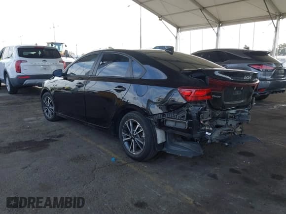 ✅ 2023 Kia Forte LXS • VIN: 3KPF24AD8PE607486 • Lot: 43666572. Listed on IAAI with 31,311 mi. Free auction sales archive from the USA and detailed vehicle history report at DreamBid. Image 3.