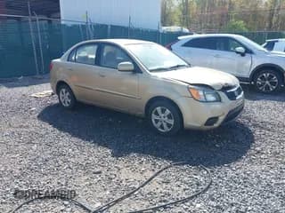 ✅ 2011 Kia Rio LX • VIN: KNADH4A30B6731289 • Lot: 42140854. Wystawiony na IAAI z przebiegiem 188 152 mil. Bezpłatny archiwum sprzedaży aukcyjnych z USA i szczegółowy raport historii pojazdu na DreamBid. Zdjęcie 1.