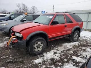 ✅ 2001 Chevrolet Blazer LS • VIN: 1GNCT18WX1K246960 • Lot: 85066144. Wystawiony na Copart z przebiegiem 133 157 mil. Bezpłatny archiwum sprzedaży aukcyjnych z USA i szczegółowy raport historii pojazdu na DreamBid. Zdjęcie 1.
