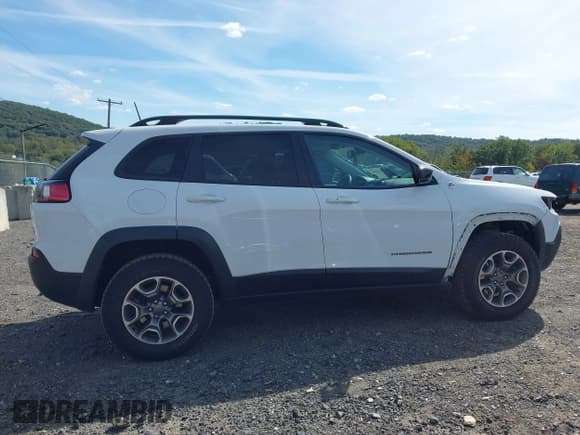 ✅ 2022 Jeep Cherokee Trailhawk • VIN: 1C4PJMBX7ND517602 • Lot: 43334056. Listed on IAAI with 77,383 mi. Free auction sales archive from the USA and detailed vehicle history report at DreamBid. Image 14.