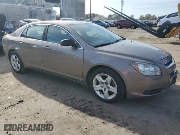 ✅ 2010 Chevrolet Malibu 1LS • VIN: 1G1ZB5EB2AF103775 • Lot: 77517804. Listed on Copart with 152,396 mi. Free auction sales archive from the USA and detailed vehicle history report at DreamBid. Image 4.