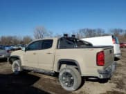 ✅ 2021 Chevrolet Colorado 4WD ZR2 • VIN: 1GCGTEEN2M1131888 • Лот: 43362985. Опубликован ранее на Copart с пробегом 51 223 миль. Бесплатный доступ к архиву аукционных продаж из США и подробный отчёт об истории автомобиля на DreamBid. Изображение 2.