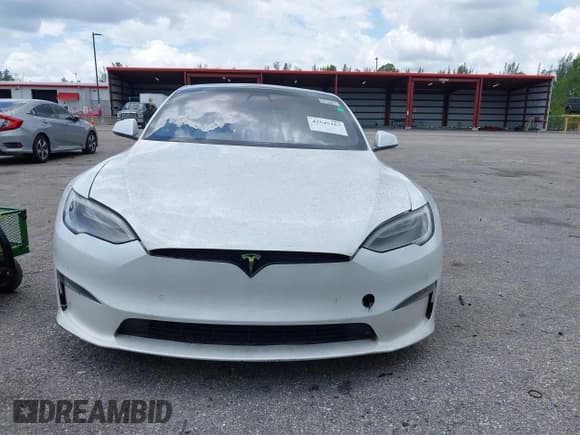 ✅ 2022 Tesla Model S Plaid • VIN: 5YJSA1E61NF460155 • Lot: 42545167. Listed on IAAI with 51,711 mi. Free auction sales archive from the USA and detailed vehicle history report at DreamBid. Image 12.