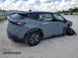 ✅ 2023 Nissan ARIYA Engage • VIN: JN1CF0BB8PM702857 • Лот: 52911584. Опубликован ранее на Copart с пробегом 611 миль. Бесплатный доступ к архиву аукционных продаж из США и подробный отчёт об истории автомобиля на DreamBid. Изображение 3.