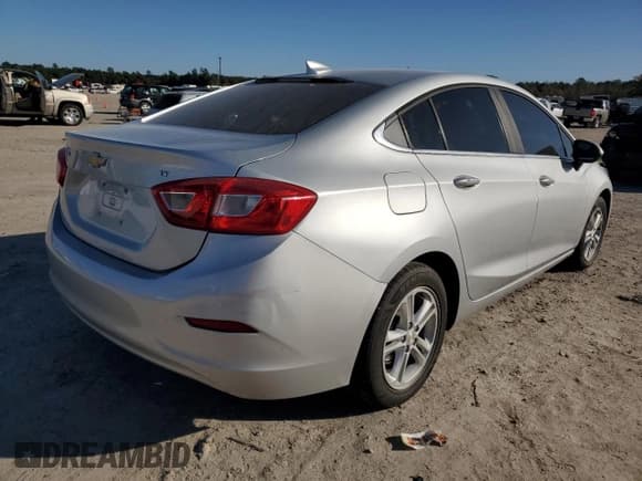 ✅ 2017 Chevrolet Cruze LT • VIN: 1G1BE5SM5H7238364 • Lot: 68253992. Listed on Copart with 76,361 mi. Free auction sales archive from the USA and detailed vehicle history report at DreamBid. Image 3.