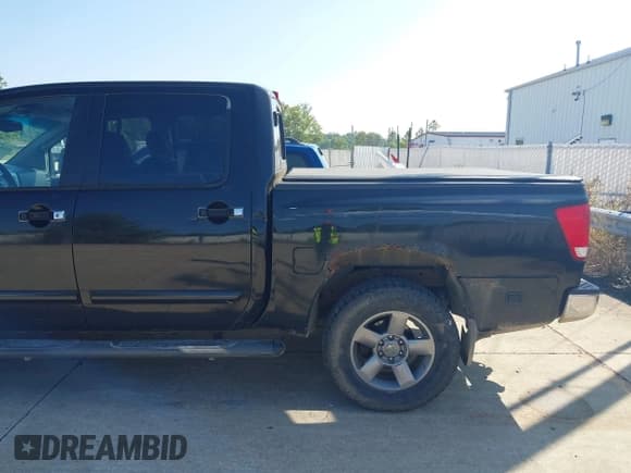 ✅ 2005 Nissan Titan LE • VIN: 1N6AA07B35N504302 • Lot: 43149610. Listed on IAAI with 171,549 mi. Free auction sales archive from the USA and detailed vehicle history report at DreamBid. Image 12.