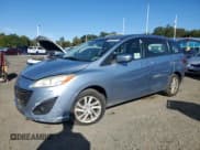 ✅ 2012 Mazda 5 Sport • VIN: JM1CW2BL2C0100216 • Lot: 85075225. Listed on Copart with 147,556 mi. Free auction sales archive from the USA and detailed vehicle history report at DreamBid. Image 1.