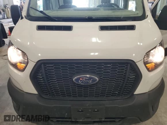 ✅ 2023 Ford Transit Cargo • VIN: 1FTBR2X89PKB38480 • Лот: 54504405. Опубликован ранее на Copart с пробегом 70 337 миль. Бесплатный доступ к архиву аукционных продаж из США и подробный отчёт об истории автомобиля на DreamBid. Изображение 12.