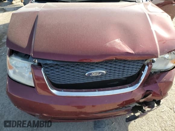 ✅ 2007 Ford Freestyle Limited • VIN: 1FMZK06197GA12890 • Lot: 75516784. Wystawiony na Copart z przebiegiem 173 296 mil. Bezpłatny archiwum sprzedaży aukcyjnych z USA i szczegółowy raport historii pojazdu na DreamBid. Zdjęcie 14.