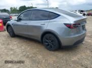 ✅ 2025 Tesla Model Y Long Range • VIN: 7SAYGDED0SA345552 • Лот: 43063341. Опубликован ранее на IAAI с пробегом 21 396 миль. Бесплатный доступ к архиву аукционных продаж из США и подробный отчёт об истории автомобиля на DreamBid. Изображение 3.