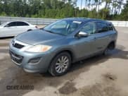 ✅ 2010 Mazda CX-9 Grand Touring • VIN: JM3TB2MA0A0216624 • Lot: 84184095. Listed on Copart with 213,735 mi. Free auction sales archive from the USA and detailed vehicle history report at DreamBid. Image 1.