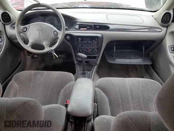 2001 Chevrolet Malibu z VIN 1G1ND52J216277589, wystawiony jako Copart lot #83456174 z przebiegiem 154 092 mil mil oraz Nie do naprawy • Non repairable. Historia ofert i sprzedaży dostępna na DreamBid. Obrazek 8.