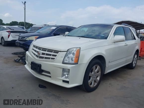 ✅ 2008 Cadillac SRX • VIN: 1GYEE63A280119057 • Lot: 42117952. Wystawiony na IAAI z przebiegiem 113 771 mil. Bezpłatny archiwum sprzedaży aukcyjnych z USA i szczegółowy raport historii pojazdu na DreamBid. Zdjęcie 2.
