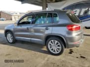 ✅ 2013 Volkswagen Tiguan S • VIN: WVGBV3AX9DW576272 • Lot: 92412365. Listed on Copart with 192,035 mi. Free auction sales archive from the USA and detailed vehicle history report at DreamBid. Image 2.