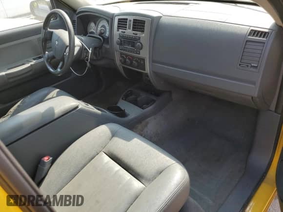 2006 Dodge Dakota SLT z VIN 1D7HW48N86S679222, wystawiony jako Copart lot #71169894 z przebiegiem 115 545 mil mil oraz Szkoda całkowita • Salvage title. Historia ofert i sprzedaży dostępna na DreamBid. Obrazek 8.