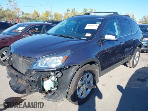 ✅ 2014 Chevrolet Traverse LT • VIN: 1GNKRHKD4EJ158914 • Lot: 43440611. Listed on IAAI with 137,402 mi. Free auction sales archive from the USA and detailed vehicle history report at DreamBid. Image 2.