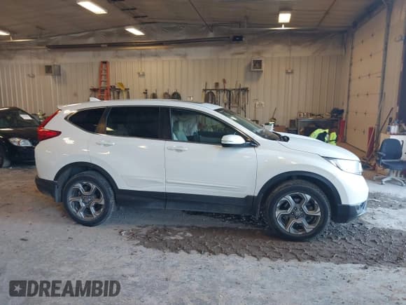 ✅ 2018 Honda CR-V EX-L • VIN: 2HKRW2H82JH608604 • Lot: 43521211. Listed on IAAI with 87,247 mi. Free auction sales archive from the USA and detailed vehicle history report at DreamBid. Image 13.