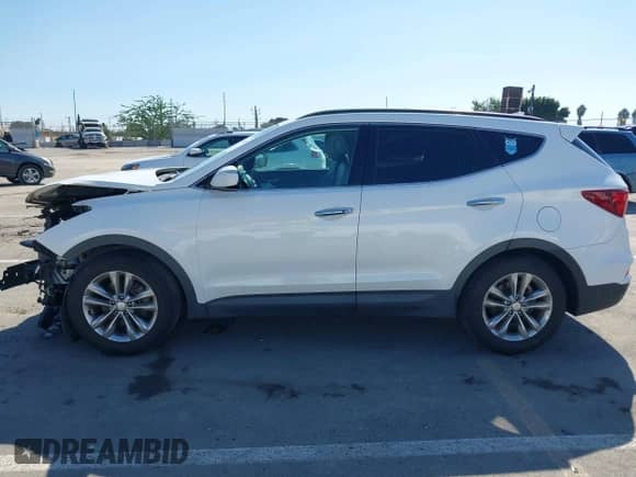 2017 Hyundai Santa Fe 2.0T z VIN 5XYZU4LA5HG484194, wystawiony jako IAAI lot #43485419 z przebiegiem 152 152 mil mil oraz . Historia ofert i sprzedaży dostępna na DreamBid. Obrazek 15.
