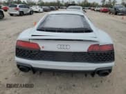 ✅ 2022 Audi R8 performance quattro • VIN: WUACEAFX2N7900201 • Лот: 82878454. Опубликован ранее на Copart с пробегом 4 248 миль. Бесплатный доступ к архиву аукционных продаж из США и подробный отчёт об истории автомобиля на DreamBid. Изображение 6.