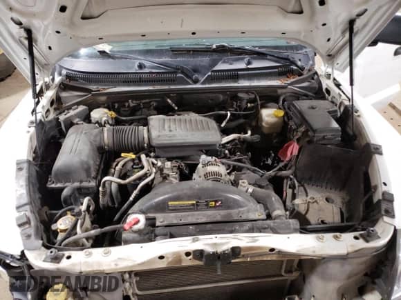 2007 Dodge Dakota ST z VIN 1D3HW28P27S242678, wystawiony jako Copart lot #58687635 z przebiegiem 196 558 mil mil oraz Czysty tytuł • Clean title. Historia ofert i sprzedaży dostępna na DreamBid. Obrazek 11.