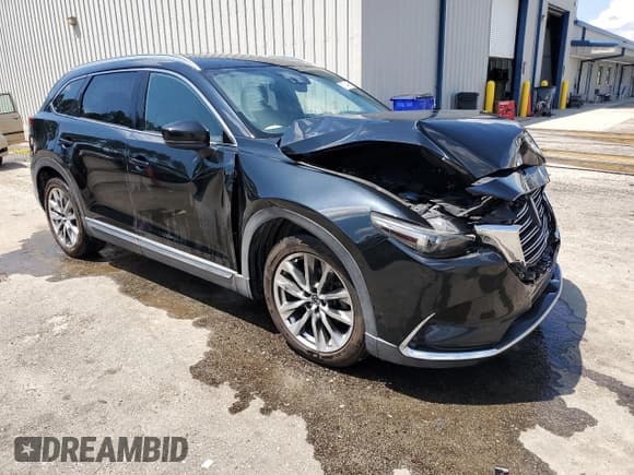 ✅ 2016 Mazda CX-9 Grand Touring • VIN: JM3TCADY6G0118016 • Lot: 67344655. Listed on Copart with 108,459 mi. Free auction sales archive from the USA and detailed vehicle history report at DreamBid. Image 4.