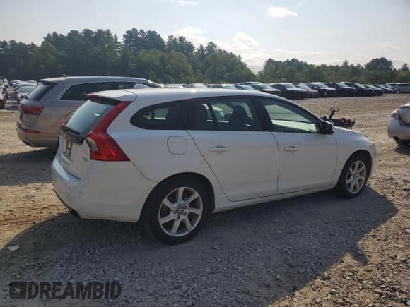 ✅ 2015 Volvo V60 • VIN: YV126MEA7F1205876 • Лот: 69235135. Опубликован ранее на Copart с пробегом 96 969 миль. Бесплатный доступ к архиву аукционных продаж из США и подробный отчёт об истории автомобиля на DreamBid. Изображение 3.
