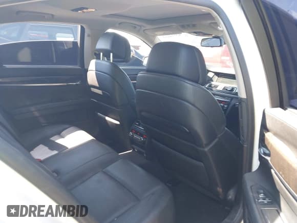 ✅ 2012 BMW 7 Series 740i • VIN: WBAKA4C58CDS99459 • Lot: 43014463. Listed on IAAI with 150,975 mi. Free auction sales archive from the USA and detailed vehicle history report at DreamBid. Image 8.