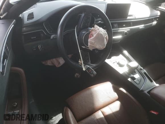 ✅ 2018 Audi A5 Premium Plus • VIN: WAUTNAF57JA103979 • Lot: 69623065. Listed on Copart with Not provided. Free auction sales archive from the USA and detailed vehicle history report at DreamBid. Image 8.