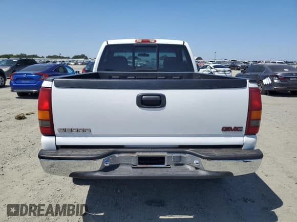 ✅ 1999 GMC Sierra 1500 SLE • VIN: 1GTEK14TXXZ502630 • Лот: 57312095. Опубликован ранее на Copart с пробегом 74 699 миль. Бесплатный доступ к архиву аукционных продаж из США и подробный отчёт об истории автомобиля на DreamBid. Изображение 6.