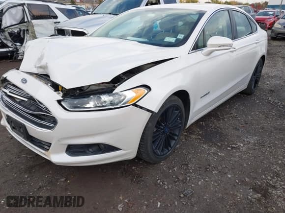 ✅ 2014 Ford Fusion SE Hybrid • VIN: 3FA6P0LU8ER175954 • Лот: 43615028. Опубликован ранее на IAAI с пробегом 108 932 миль. Бесплатный доступ к архиву аукционных продаж из США и подробный отчёт об истории автомобиля на DreamBid. Изображение 6.
