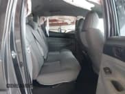 ✅ 2015 Toyota Tacoma • VIN: 3TMLU4EN6FM198795 • Lot: 41612057. Listed on IAAI with 103,001 mi. Free auction sales archive from the USA and detailed vehicle history report at DreamBid. Image 8.