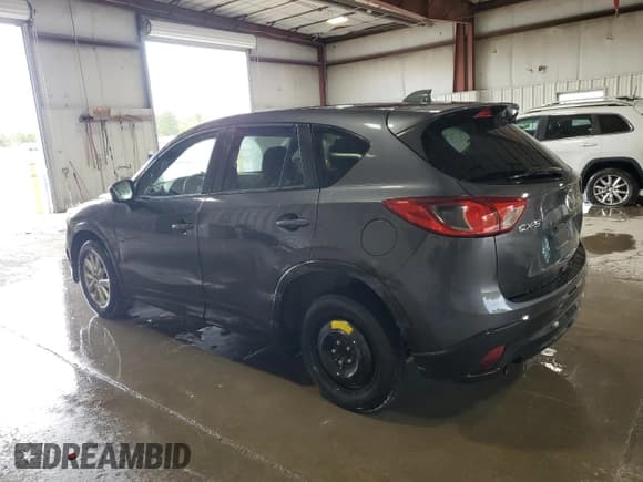 ✅ 2015 Mazda CX-5 Touring • VIN: JM3KE2CY6F0506259 • Lot: 69928775. Listed on Copart with 140,555 mi. Free auction sales archive from the USA and detailed vehicle history report at DreamBid. Image 2.