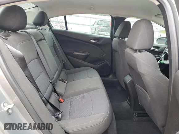 ✅ 2018 Chevrolet Cruze LT • VIN: 1G1BE5SMXJ7246580 • Lot: 81863505. Listed on Copart with 93,506 mi. Free auction sales archive from the USA and detailed vehicle history report at DreamBid. Image 10.