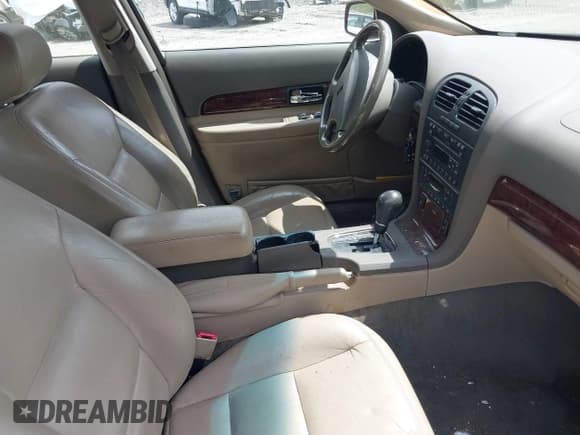 ✅ 2000 Lincoln LS • VIN: 1LNHM87A7YY901721 • Лот: 42263724. Опубликован ранее на IAAI с пробегом 121 365 миль. Бесплатный доступ к архиву аукционных продаж из США и подробный отчёт об истории автомобиля на DreamBid. Изображение 5.