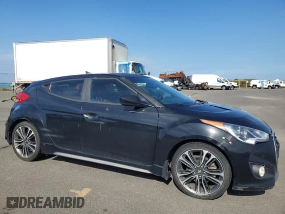 ✅ 2016 Hyundai Veloster Turbo • VIN: KMHTC6AE6GU263562 • Lot: 62899445. Wystawiony na Copart z przebiegiem 88 545 mil. Bezpłatny archiwum sprzedaży aukcyjnych z USA i szczegółowy raport historii pojazdu na DreamBid. Zdjęcie 4.