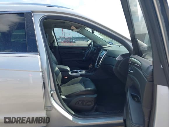 ✅ 2013 Cadillac SRX Performance Collection • VIN: 3GYFNDE30DS513053 • Lot: 43530295. Listed on IAAI with 124,178 mi. Free auction sales archive from the USA and detailed vehicle history report at DreamBid. Image 5.