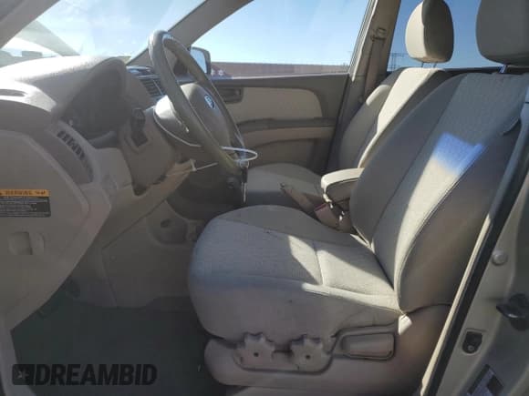 ✅ 2007 Kia Sportage LX • VIN: KNDJF724877373266 • Lot: 82785855. Listed on Copart with 215,630 mi. Free auction sales archive from the USA and detailed vehicle history report at DreamBid. Image 7.