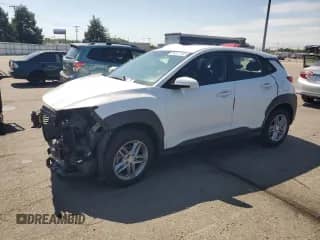 2018 Hyundai Kona SE z VIN KM8K12AA2JU178409, wystawiony jako Copart lot #80211765 z przebiegiem 73 772 mil mil oraz Szkoda całkowita • Salvage title. Historia ofert i sprzedaży dostępna na DreamBid. Obrazek 1.