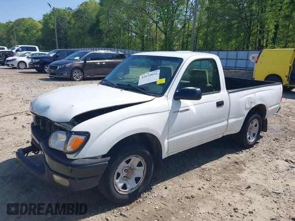 ✅ 2004 Toyota Tacoma • VIN: 5TENL42N74Z412936 • Lot: 42039092. Listed on IAAI with 289,926 mi. Free auction sales archive from the USA and detailed vehicle history report at DreamBid. Image 2.