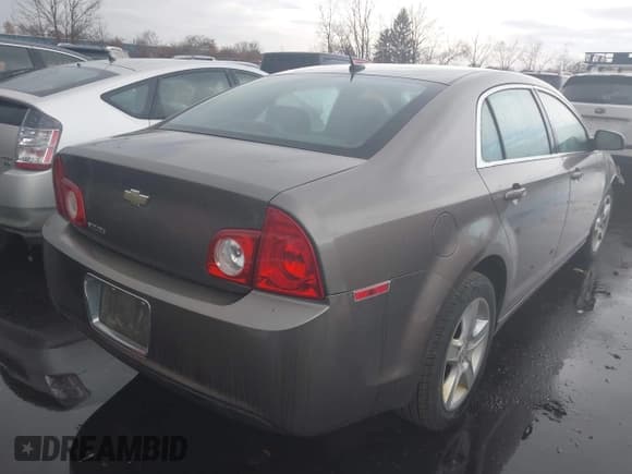 ✅ 2010 Chevrolet Malibu 1LS • VIN: 1G1ZB5EB2AF280164 • Lot: 43607905. Listed on IAAI with 116,342 mi. Free auction sales archive from the USA and detailed vehicle history report at DreamBid. Image 4.