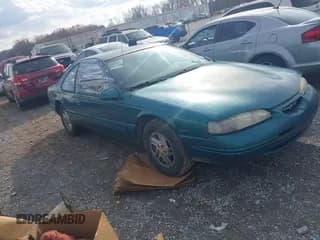 ✅ 1996 Ford Thunderbird LX • VIN: 1FALP6244TH161443 • Lot: 43747980. Listed on IAAI with 173,871 mi. Free auction sales archive from the USA and detailed vehicle history report at DreamBid. Image 1.
