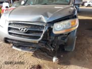 ✅ 2009 Hyundai Santa Fe GL • VIN: 5NMSG73E79H263961 • Lot: 41419880. Listed on IAAI with 165,964 mi. Free auction sales archive from the USA and detailed vehicle history report at DreamBid. Image 6.