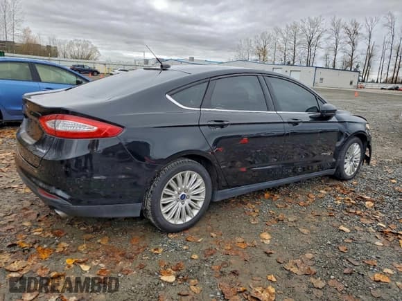 ✅ 2016 Ford Fusion S Hybrid • VIN: 3FA6P0UU1GR118805 • Lot: 93336205. Wystawiony na Copart z przebiegiem 141 238 mil. Bezpłatny archiwum sprzedaży aukcyjnych z USA i szczegółowy raport historii pojazdu na DreamBid. Zdjęcie 3.