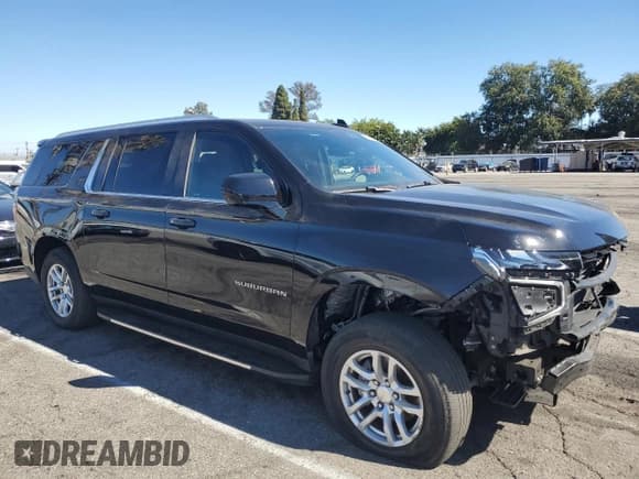 ✅ 2023 Chevrolet Suburban LS • VIN: 1GNSCBKDXPR148942 • Lot: 69675865. Listed on Copart with 81,844 mi. Free auction sales archive from the USA and detailed vehicle history report at DreamBid. Image 4.