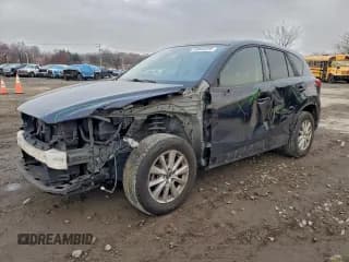 ✅ 2013 Mazda CX-5 Touring • VIN: JM3KE4CE4D0142258 • Lot: 93944225. Listed on Copart with 165,027 mi. Free auction sales archive from the USA and detailed vehicle history report at DreamBid. Image 1.