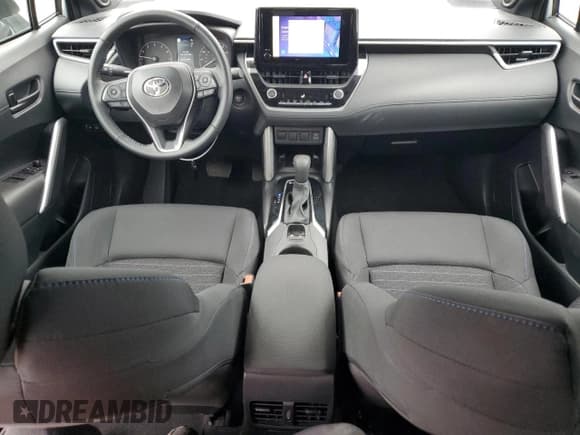 ✅ 2024 Toyota Corolla Cross Hybrid XSE • VIN: 7MUFBABG7RV050284 • Лот: 90690585. Опубликован ранее на Copart с пробегом 6 690 миль. Бесплатный доступ к архиву аукционных продаж из США и подробный отчёт об истории автомобиля на DreamBid. Изображение 8.