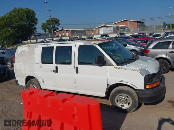 ✅ 2012 Chevrolet Express Cargo • VIN: 1GCWGFCBXC1116892 • Lot: 43021023. Listed on IAAI with 122,063 mi. Free auction sales archive from the USA and detailed vehicle history report at DreamBid. Image 13.