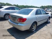 ✅ 2005 Toyota Corolla CE • VIN: JTDBR32E250055971 • Lot: 42660536. Listed on IAAI with 299,999 mi. Free auction sales archive from the USA and detailed vehicle history report at DreamBid. Image 4.