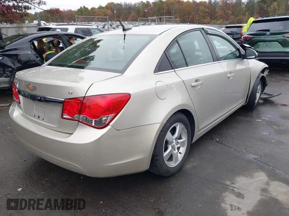 ✅ 2013 Chevrolet Cruze 1LT • VIN: 1G1PC5SBXD7147918 • Lot: 43573003. Listed on IAAI with 79,414 mi. Free auction sales archive from the USA and detailed vehicle history report at DreamBid. Image 4.
